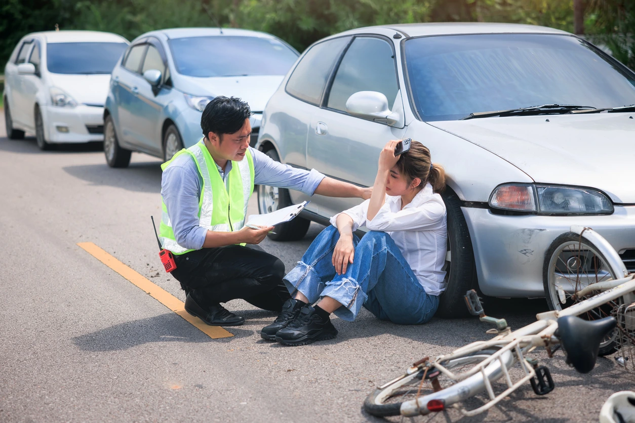 Accident, crash or collision of auto car, bicycle at outdoor. Include asian people i.e. 